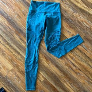 Green lululemon leggings with mesh detailing